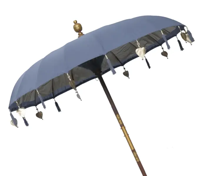 Product image of the product “Bali umbrella, Dark Grey 1 with wooden coins and gold leaves hanging around the edge. Approx. 190cm dia. and 250cm height ”